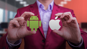 A-man-in-a-suit-displays-two-icons,-representing-Android-vs-iOS-development,-highlighting-the-tech-rivalry